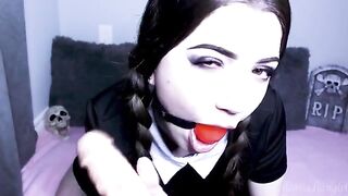 Wednesday Addams gets fucked by a big dildo and gives a blowjob to the camera