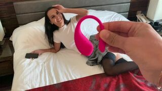 A girl masturbates using a lovense lush toy, showcasing intense orgasms