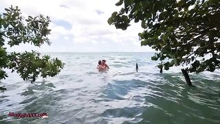 Babe has amazing sex right in the blue water, showcasing sensual and romantic vibes