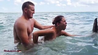Babe has amazing sex right in the blue water, showcasing sensual and romantic vibes