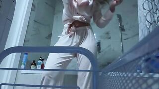 The girl caresses her sweet pussy in the bathroom, no one sees it
