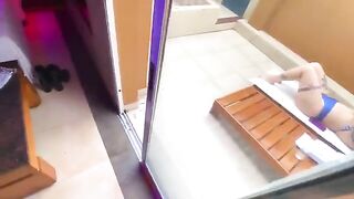 A juicy red-haired woman has sex with the employee in a bikini