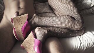 The sexy girl shows off her legs in stockings