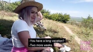A girl is having fun with a stranger in the yard. It all started with a flirty look