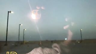 A dirty whore is having fun with a guy in the car in the parking lot
