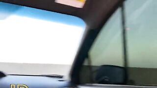 A dirty whore is having fun with a guy in the car in the parking lot