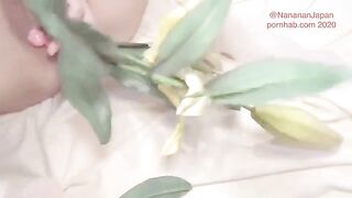 Bukkake while putting flowers in the anus of a shaved girl