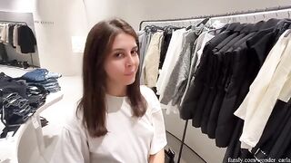 A girl is trying on dresses in the fitting room and gets fucked by a stranger
