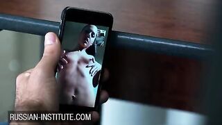 The young girl warms up her boyfriend with a video call and a toy