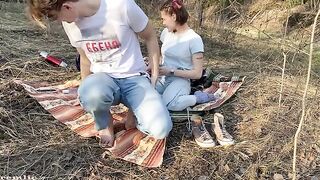 A girl is walking in the woods and suddenly gets frisky