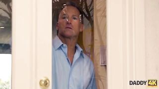 A mischievous girl is having fun with her boyfriend’s stepfather
