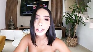 A beautiful girl is training with her personal trainer in a steamy session