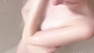 We shower, massage each other, and have sex over the couch in this steamy scene