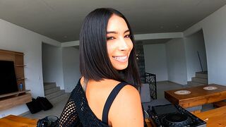 A sexy girl is learning to DJ from a handsome guy, getting intimate