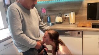 An old man fucked a German amateur in the kitchen, right in front of his wife