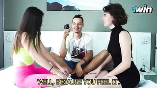 Two girls playing a sensual game with a twist, kissing and guessing
