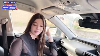 A girl got attached to a car and began to engage in oral play