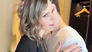 A wife is having fun with two guys at a party and gets covered with cum