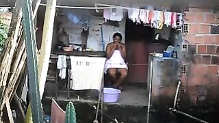 A black girl has no idea there’s a secret camera in the room
