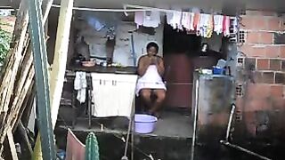 A black girl has no idea there’s a secret camera in the room
