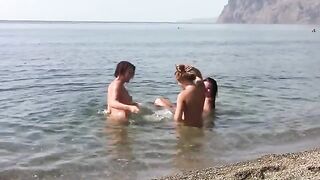 Three sexy girls with shaved pussy on the beach