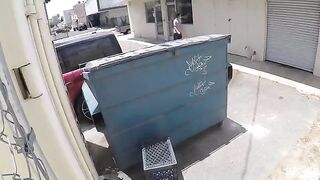 A girl was photographed having sex behind the garbage tank with a hidden camera