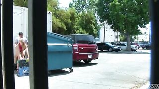 A girl was photographed having sex behind the garbage tank with a hidden camera