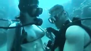 Aqualangists enjoy intense sex at the bottom of the sea