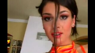 Beautiful woman masturbating on a leather chair, achieving intense pleasure