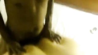 A fat woman lays on two guys who fuck her hard on the bed