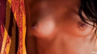 Girl with a nipple piercing plays with her fingers