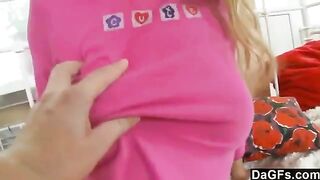 Young and sweet blonde in a pink skirt