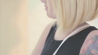 A sexy tattooed girl plays with herself and reaches orgasm
