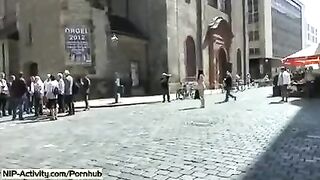 A girl showed her pussy to the entire city on a naked walk