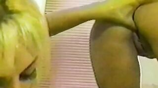 Two hot girls are having fun in the shower with a toy