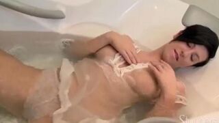 Brunette takes shower and masturbates her hot pussy