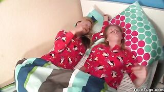 Two girls share a cock while jerking, giving an amazing view