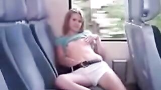 Lifting the skirt on the bus and ironing the pussy