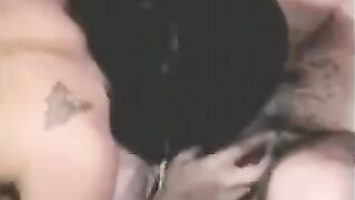A guy fucks a girl with a strapon, while another plays with his cock