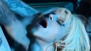 A sexy girl in a corset and stockings, teasing with her big fake tits