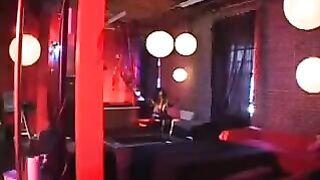 Black woman in a latex suit vigorously rides a member
