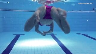 Naked beauty swimming in the pool is a very exciting scene