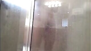 A man washes himself in the shower, but there’s a camera