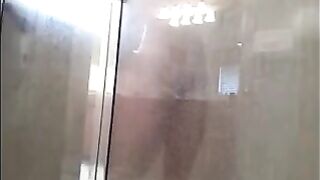 A man washes himself in the shower, but there’s a camera