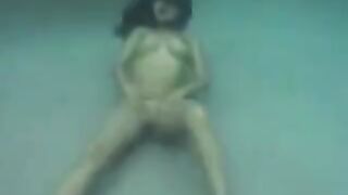 Sex in the ocean with a busty brunette can be exciting