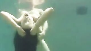 Sex in the ocean with a busty brunette can be exciting