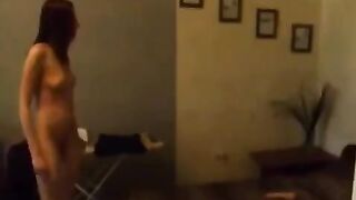 A girl caressed herself at the kitchen in Russian style