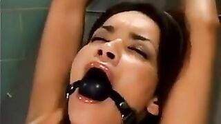 Girl was fucked by a bald guy on the sex machine