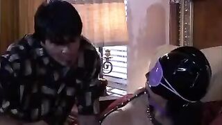 A beautiful woman plays a BDSM game with her lover