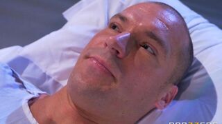Nurse gave her breast to suck to the patient